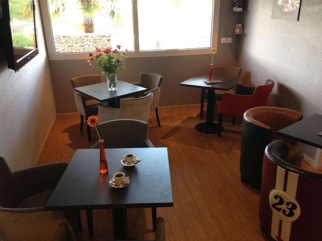 Brit Hotel Les Evens Saint-Saturnin  Restaurace fotografie